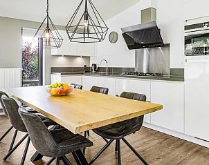 Buitenzijde van Amerongse Berg bungalow met jacuzzi in Overberg, Utrecht