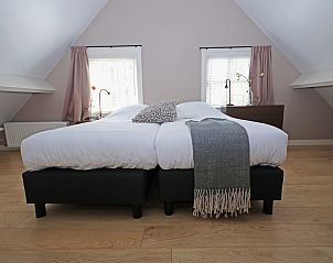 Lichte slaapkamer in Vakantiewoning Molenbosch, Doorn. Comfortabel vakantiehuis op de Utrechtse Heuvelrug, Utrecht, met uitnodigende sfeer.