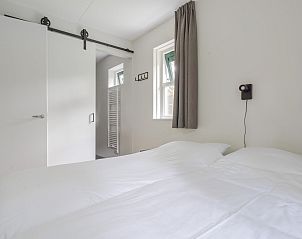 Slaapkamer met twee bedden in Vakantiewoning Heidestein, Doorn, Utrechtse Heuvelrug.