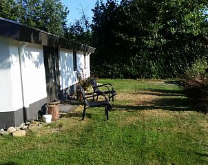 Relax op de groene grasvelden bij Vakantiehuis in Rhenen, Utrechtse Heuvelrug, Utrecht.