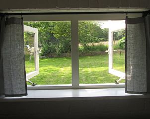 Uitzicht op de tuin vanuit Vakantiehuis in Rhenen, Utrechtse Heuvelrug, Utrecht.