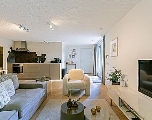 Gezellige zithoek in Huisje in Rhenen, Utrechtse Heuvelrug, perfect voor ontspanning en samenzijn.