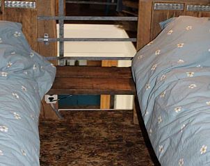 Knusse eenpersoonsbedden op de loft in Vakantiehuisje in Achterveld, Utrechtse Heuvelrug, Utrecht.