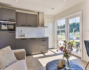 Gezellige woonruimte met keuken in Tiny house 3 persoons, Lexmond, Utrecht.