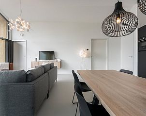 Bright and spacious living room in Cottage in Wissenkerke, ideal for relaxation.