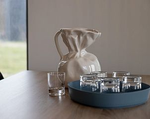 Stylish decoration on the table at Cottage in Wissenkerke, North Beveland.