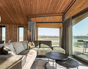 Comfortable seating area in Cottage in Wissenkerke, a vacation home in Wissenkerke, North Beveland, Zeeland.