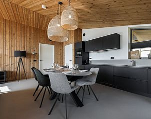 Cozy living room with view in Cottage in Wissenkerke, located in Wissenkerke, North Beveland, Zeeland.