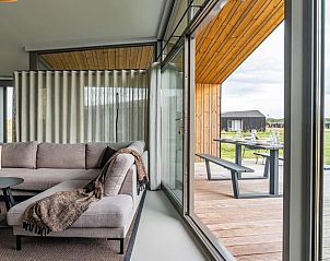 Veranda with view of nature in Holiday home in Wissenkerke, North Beveland, Zeeland.