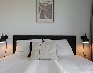 Comfortable bedroom in Holiday home in Wissenkerke, perfect for a relaxing stay in Noord-Beveland, Zeeland.