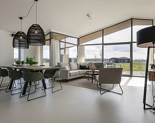 Bright and spacious living room in Holiday home in Wissenkerke, perfect for relaxation in North Beveland, Zeeland.