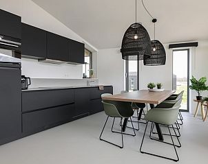 Spacious cottage kitchen in Wissenkerke with modern appliances in North Beveland, Zeeland.