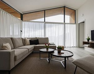 Cozy sitting area in Holiday home in Wissenkerke with beautiful view of North Beveland, Zeeland.