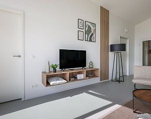 Modern living room in Holiday home in Wissenkerke with stylish decor in North Beveland, Zeeland.