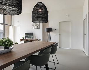 Modern living room in Holiday home in Wissenkerke with comfortable furniture in Noord-Beveland, Zeeland.