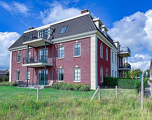 SeaLuxe Residence 27C in Colijnsplaat, een vakantiehuis met luxe uitstraling te midden van het groene landschap van Noord-Beveland, Zeeland.