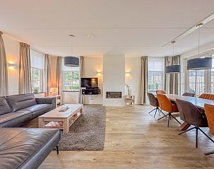 Stijlvolle open leefruimte in Coast Comfort vakantiehuis, Colijnsplaat, perfect voor familiebijeenkomsten, Noord-Beveland, Zeeland.