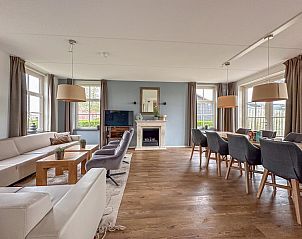 Eet- en zitgedeelte van Sea Sun Relax 37 in Colijnsplaat, vakantiehuis met stijlvolle inrichting en veel lichtinval.