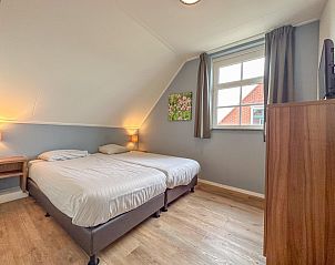 Stijlvolle slaapkamer in Sea Sun Relax 37 in Colijnsplaat, vakantiehuis met moderne inrichting en veel comfort.