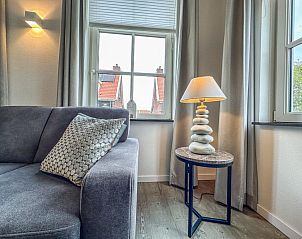 Detail van de woonkamer in Dune Design vakantiehuis, Colijnsplaat, met moderne voorzieningen.