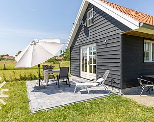 Ferienhaus ZE1208 in Kamperland mit Sonnenterrasse und Sonnenschirm in Noord-Beveland, Zeeland.