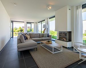 Stilvolles Wohnzimmer des Ferienhauses Duinvallei 34 in Kamperland, Noord-Beveland.