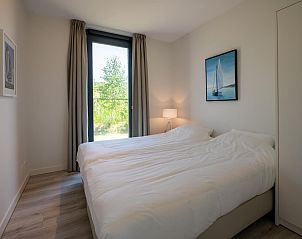 Slaapkamer met uitzicht in Zandbank 04 | De Groote Duynen, Kamperland, Zeeland.