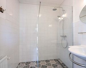 Gezellige zithoek met kachel in Zwanenlaan 13 De Schotsman vakantiehuis Kamperland Zeeland