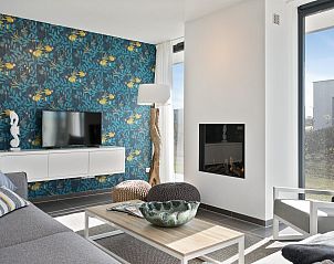 Gemtliches Wohnzimmer im Ferienhaus Waterline 19, Kamperland mit moderner Einrichtung.