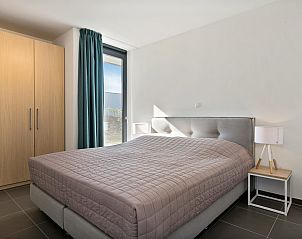 Schlafzimmer mit bequemem Bett im Ferienhaus Waterline 19, De Groote Duynen, Kamperland.