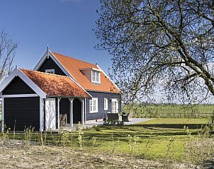 Rustieke charme van VZ2302 Boerderijwoning in Kamperland, vakantiehuis omgeven door natuur in Noord-Beveland, Zeeland.
