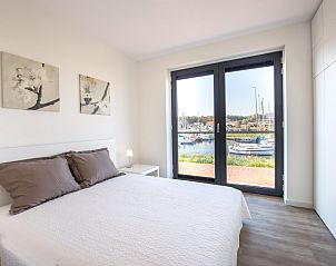 Helles Schlafzimmer in Uithaven 10 | d'Ouwe Haven, Ferienhaus in Kamperland mit Blick auf die Boote.
