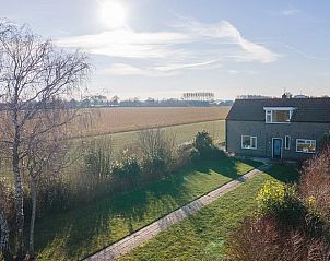 Vakantiehuisje in Kamperland met uitgestrekt uitzicht over de velden in Noord-Beveland, Zeeland.