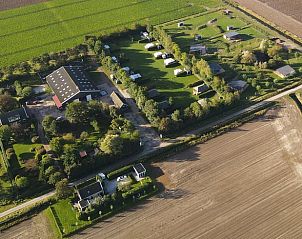 Aerial view of area cottage in Kamperland, surrounded by nature in Zeeland.