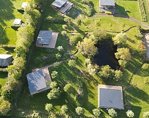 Overzicht van vakantiehuis in Kamperland met omliggende natuur, ideaal voor rustzoekers in Noord-Beveland, Zeeland.