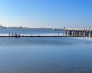 Prachtig uitzicht op het water nabij Vakantiehuisje in Kamperland, perfect voor ontspanning.