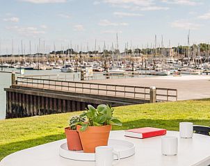 Terras van Ostrea 25 | Roompot Beach Resort, vakantiehuis in Kamperland, met uitzicht op de jachthaven.