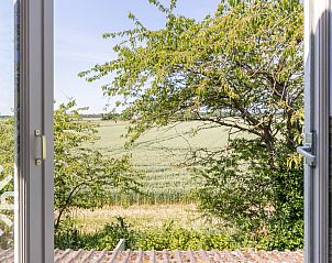 Offener Wohnbereich mit Kche und Sitzecke im Ferienhaus ZE184, Kamperland, Nord-Beveland.