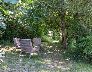 Schlafzimmer mit Blick auf die Terrasse im Ferienhaus ZE184, Kamperland, Noord-Beveland, Zeeland.