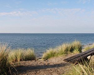 Aussicht auf das Meer und die Dnen im Ferienhaus VZ1178 in Kamperland, ruhige Umgebung.