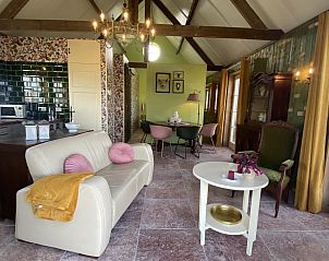 Stylish living room of VZ962 Holiday home in Kamperland, interior with retro accents in North Beveland, Zeeland.