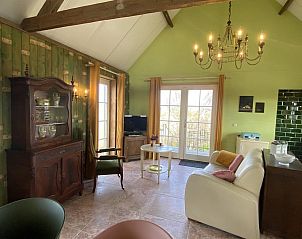 Cozy sitting area in VZ962 Holiday home in Kamperland, with antique furniture in North Beveland, Zeeland.