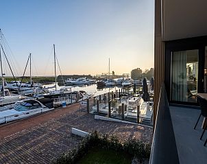 Prachtig uitzicht op de jachthaven bij VZ2407 Vakantieappartement in Kamperland, Noord-Beveland.