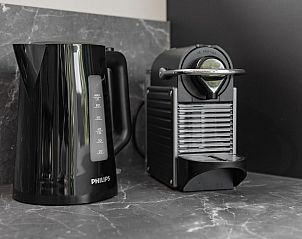 Modern kitchen appliances in Sauna Lodge 2 in Kamperland, Noord-Beveland, Zeeland, offers comfort in this luxury vacation home.