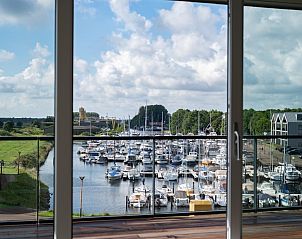 Blick auf den Yachthafen vom Balkon im Penthouse Veerweg 173, Kamperland, Ferienhaus in Port Elisabeth, Zeeland.