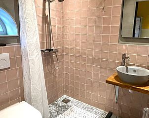 Bright kitchen area of vacation home ZE1460 in Kamperland, North Beveland, with access to the garden.