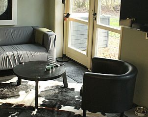 Authentic facade of vacation home ZE1460 in Kamperland, North Beveland, located in a green area.