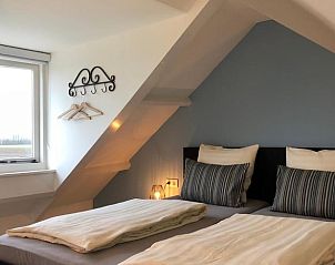 Verfrissend uitzicht vanuit de woonkamer van Vakantiehuis in Kamperland, Noord-Beveland, Zeeland.