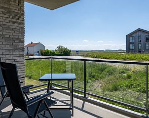 Veranda with view of surroundings at Veerweg 163 vacation home, Kamperland, Noord-Beveland, Zeeland.