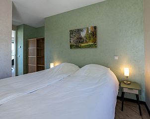 Second bedroom in Veerweg 163 vacation home, Kamperland, Noord-Beveland, Zeeland with soothing colors.